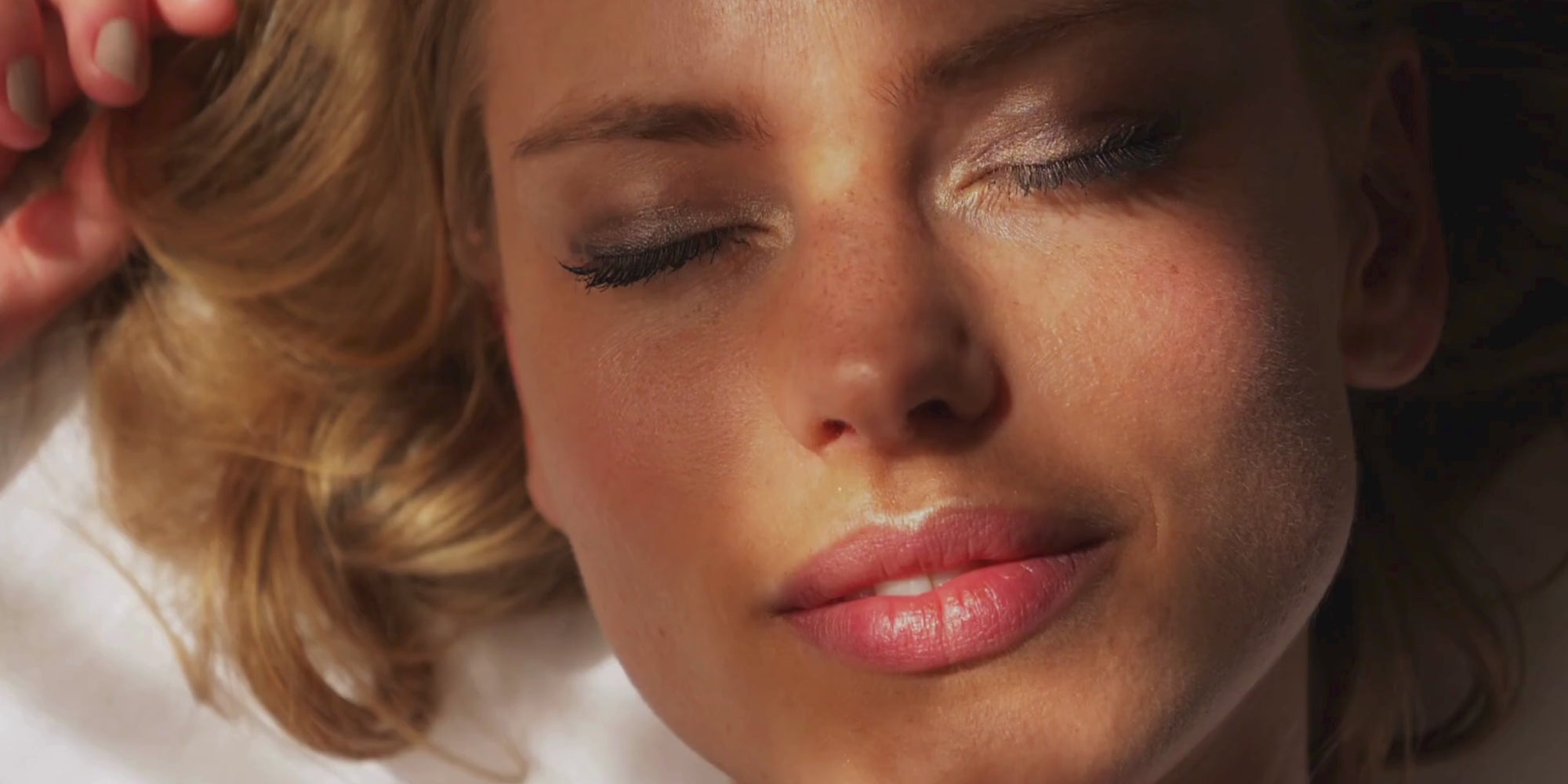 Video of a beautiful woman with healthy, glowing skin showcasing a radiant and natural complexion with Karin Herzog skincare.